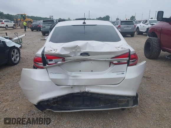 2017 Ford Fusion Titanium with VIN 3FA6P0D96HR239830, listed as a IAAI auction lot 42741998 with 116,951 mi miles and . Bid and sale history available at DreamBid. Image 17.