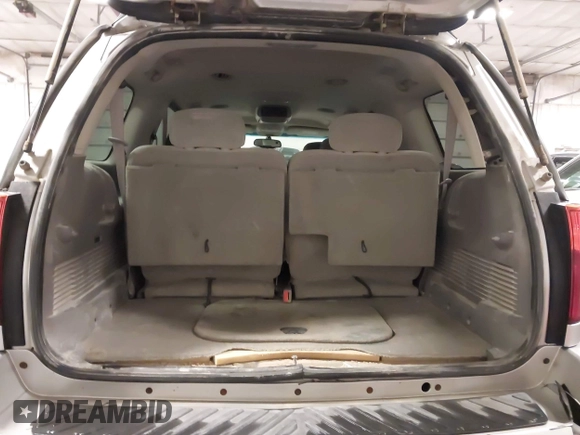 2005 GMC Envoy SLE with VIN 1GKET16S656102522, listed as a IAAI auction lot 41729310 with 233,049 mi miles. Bid and sale history available at carsss.com. Image 18.