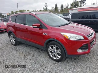 2014 Ford Escape Titanium with VIN 1FMCU9J9XEUD71715, listed as a IAAI auction lot 42127982 with 96,549 mi miles and . Bid and sale history available at DreamBid. Image 1.