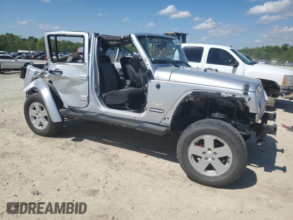 2007 Jeep Wrangler Unlimited Sahara with VIN 1J4GA59147L207482, listed as a Copart auction lot 55666615 with 151,525 mi miles and Salvage title. Bid and sale history available at DreamBid. Image 4.