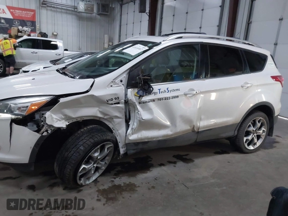 2016 Ford Escape Titanium with VIN 1FMCU9J94GUC79910, listed as a IAAI auction lot 41644467 with 43,261 mi miles. Bid and sale history available at carsss.com. Image 14.