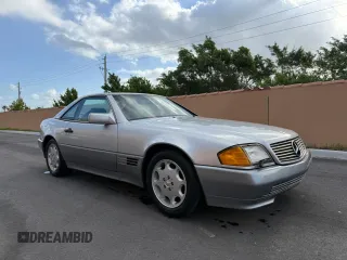 1994 Mercedes-Benz SL z VIN WDBFA63E0RF094472, wystawiony jako Copart lot #58923925 z przebiegiem 55 706 mil mil oraz Tytuł czysty. Historia ofert i sprzedaży dostępna na DreamBid. Obrazek 1.