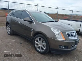 2014 Cadillac SRX Performance Collection with VIN 3GYFNCE31ES509461, listed as a IAAI auction lot 41908431 with 150,915 mi miles. Bid and sale history available at carsss.com. Image 1.