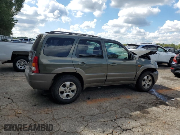 2002 Mazda Tribute LX with VIN 4F2YU09122KM55085, listed as a Copart auction lot 71604184 with 185,158 mi miles and Salvage Title. Bid and sale history available at DreamBid. Image 3.