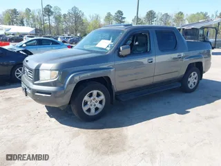 2007 Honda Ridgeline RTL w/Leather with VIN 2HJYK16557H531198, listed as a IAAI auction lot 41998612 with 194,975 mi miles. Bid and sale history available at carsss.com. Image 2.