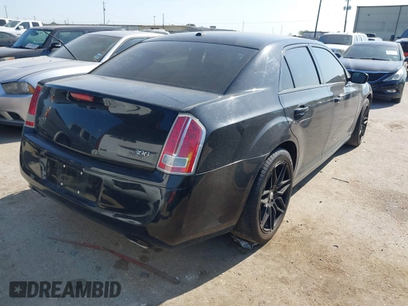 2013 Chrysler 300 with VIN 2C3CCAAGXDH660851, listed as a IAAI auction lot 41970721 with 112,017 mi miles and . Bid and sale history available at carsss.com. Image 4.