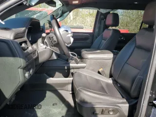 2023 Chevrolet Suburban LT with VIN 1GNSCCKD3PR125671, listed as a Copart auction lot 46734575 with 158,217 mi miles and Salvage title. Bid and sale history available at DreamBid. Image 7.