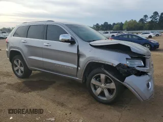 2016 Jeep Grand Cherokee Overland with VIN 1C4RJFCT2GC320247, listed as a Copart auction lot 50832195 with 104,300 mi miles and Salvage title. Bid and sale history available at DreamBid. Image 4.
