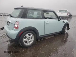 2011 MINI Hardtop with VIN WMWSU3C57BT096973, listed as a Copart auction lot 52726185 with 90,545 mi miles and Salvage title. Bid and sale history available at DreamBid. Image 3.