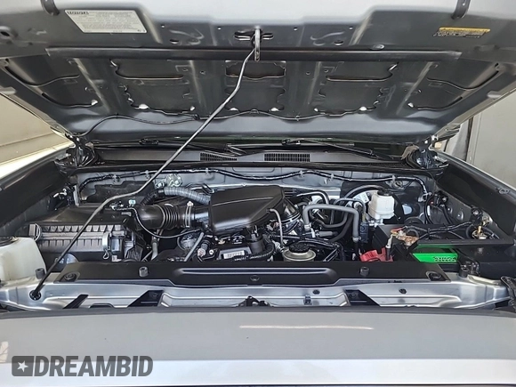 2019 Toyota Tacoma SR with VIN 5TFRX5GN1KX143485, listed as a IAAI auction lot 42763045 with 90,847 mi miles and . Bid and sale history available at DreamBid. Image 2.