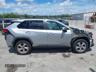 2021 Toyota RAV4 Hybrid LE with VIN 2T3B6RFV2MW018967, listed as a IAAI auction lot 42601989 with 71,046 mi miles and . Bid and sale history available at DreamBid. Image 14.