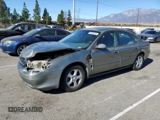 2001 Ford Taurus LX Standard z VIN 1FAFP52U51A138332, wystawiony jako Copart lot #88528355 z przebiegiem 166 511 mil mil oraz Szkoda całkowita • Salvage title. Historia ofert i sprzedaży dostępna na DreamBid. Obrazek 1.
