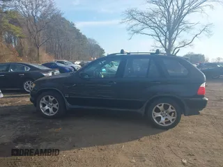 2003 BMW X5 4.4i with VIN 5UXFB33543LH43200, listed as a IAAI auction lot 41652303 with 169,250 mi miles. Bid and sale history available at carsss.com. Image 14.