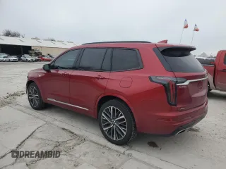 2023 Cadillac XT6 AWD Sport z VIN 1GYKPGRS5PZ221207, wystawiony jako Copart lot #41876425 z przebiegiem 23 193 mil mil oraz Szkody całkowita. Historia ofert i sprzedaży dostępna na DreamBid. Obrazek 2.