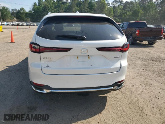 2024 Mazda CX-90 Premium z VIN JM3KKDHD5R1189566, wystawiony jako Copart lot #53689405 z przebiegiem Nie podano mil oraz Szkoda całkowita • Salvage title. Historia ofert i sprzedaży dostępna na DreamBid. Obrazek 6.