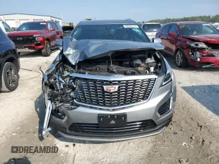 2023 Cadillac XT5 AWD Premium Luxury with VIN 1GYKNDR40PZ152982, listed as a Copart auction lot 69569914 with 24,829 mi miles and Salvage Title. Bid and sale history available at DreamBid. Image 5.