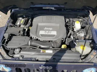 2013 Jeep Wrangler Sahara with VIN 1C4AJWBG3DL516842, listed as a Copart auction lot 49246065 with 129,594 mi miles and Salvage title. Bid and sale history available at DreamBid. Image 12.