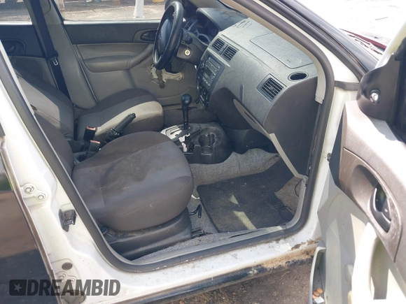 2006 Ford Focus S with VIN 1FAFP34N76W233950, listed as a IAAI auction lot 42596698 with 262,504 mi miles and . Bid and sale history available at DreamBid. Image 5.
