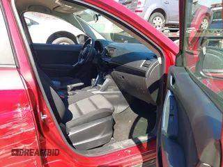 2014 Mazda CX-5 Touring with VIN JM3KE2CY2E0374440, listed as a IAAI auction lot 41634144 with 106,145 mi miles and . Bid and sale history available at DreamBid. Image 5.