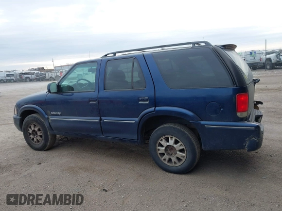 2000 GMC Jimmy SLE Convenience z VIN 1GKDT13W8Y2340743, wystawiony jako IAAI lot #41393906 z przebiegiem 196 520 mil mil oraz . Historia ofert i sprzedaży dostępna na DreamBid. Obrazek 15.