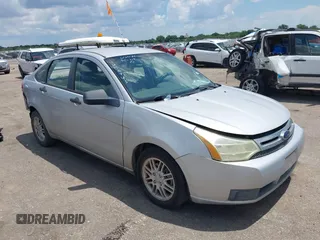 2008 Ford Focus SE with VIN 1FAHP35N98W142124, listed as a IAAI auction lot 40725584 with 174,420 mi miles and . Bid and sale history available at DreamBid. Image 1.