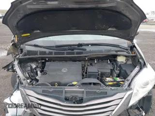 2015 Toyota Sienna LE AAS with VIN 5TDKK3DC1FS615090, listed as a IAAI auction lot 41965112 with 116,745 mi miles. Bid and sale history available at carsss.com. Image 10.