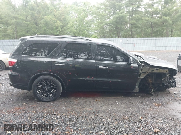 2013 Dodge Durango Crew with VIN 1C4RDJDG8DC675527, listed as a IAAI auction lot 42452197 with 184,981 mi miles and . Bid and sale history available at DreamBid. Image 13.