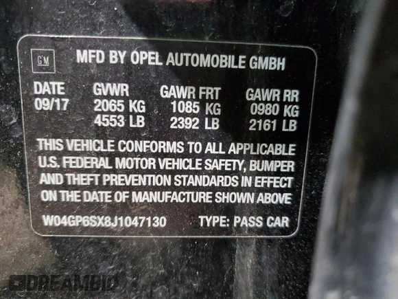 2018 Buick Regal Essence with VIN W04GP6SX8J1047130, listed as a Copart auction lot 50153395 with 97,679 mi miles and Clean title. Bid and sale history available at DreamBid. Image 12.