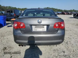 2006 Volkswagen Jetta z VIN 3VWDG71K26M673879, wystawiony jako Copart lot #75674634 z przebiegiem 93 689 mil mil oraz Szkoda całkowita • Salvage title. Historia ofert i sprzedaży dostępna na DreamBid. Obrazek 6.