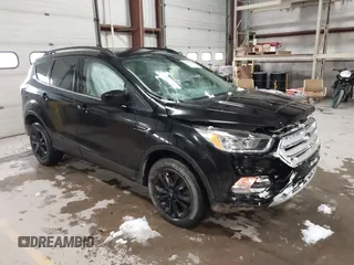 2018 Ford Escape SE with VIN 1FMCU9GD7JUD36295, listed as a IAAI auction lot 41855037 with 85,305 mi miles. Bid and sale history available at carsss.com. Image 1.