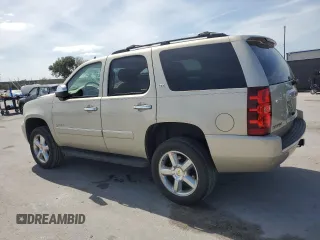 2013 Chevrolet Tahoe LTZ with VIN 1GNSCCE00DR186948, listed as a Copart auction lot 53054575 with 143,048 mi miles and Non repairable. Bid and sale history available at DreamBid. Image 2.