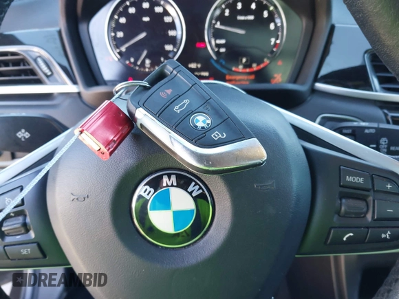 2019 BMW X2 sDrive28i with VIN WBXYJ3C50KEP77327, listed as a IAAI auction lot 40922194 with 94,672 mi miles. Bid and sale history available at carsss.com. Image 11.