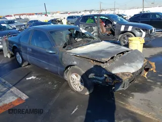 1997 Ford Thunderbird LX with VIN 1FALP62W4VH115924, listed as a IAAI auction lot 41251348 with Not Provided miles and . Bid and sale history available at DreamBid. Image 1.