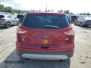 2014 Ford Escape SE z VIN 1FMCU9G95EUD55672, wystawiony jako Copart lot #65274425 z przebiegiem Nie podano mil oraz Szkoda całkowita • Salvage title. Historia ofert i sprzedaży dostępna na DreamBid. Obrazek 6.