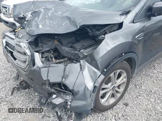 2017 Ford Escape SE z VIN 1FMCU0GD8HUE00754, wystawiony jako IAAI lot #42127911 z przebiegiem 169 487 mil mil oraz . Historia ofert i sprzedaży dostępna na DreamBid. Obrazek 6.