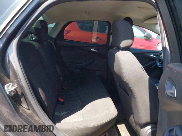 2016 Ford Focus SE with VIN 1FADP3F21GL268058, listed as a IAAI auction lot 42053944 with 103,785 mi miles and . Bid and sale history available at DreamBid. Image 8.