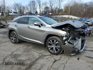 2018 Lexus RX with VIN 2T2BZMCA2JC161057, listed as a Copart auction lot 49801635 with 84,870 mi miles and Salvage Title. Bid and sale history available at carsss.com. Image 4.