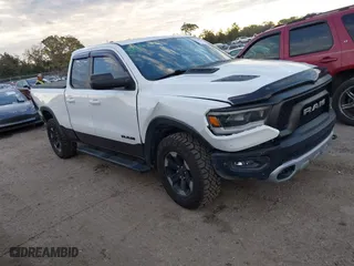 2019 Ram 1500 Rebel with VIN 1C6SRFET2KN860824, listed as a IAAI auction lot 41284779 with 105,715 mi miles. Bid and sale history available at carsss.com. Image 1.