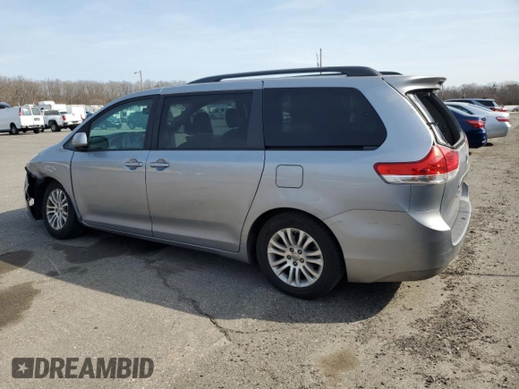 2012 Toyota Sienna XLE AAS with VIN 5TDYK3DCXCS235414, listed as a Copart auction lot 48776245 with 149,658 mi miles and Salvage Title. Bid and sale history available at carsss.com. Image 2.