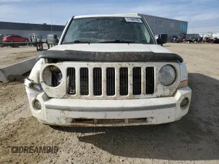 2010 Jeep Patriot Sport with VIN 1J4NF2GB2AD525475, listed as a Copart auction lot 51986785 with 90,659 mi miles and Salvage Title. Bid and sale history available at carsss.com. Image 5.