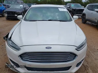 2015 Ford Fusion SE with VIN 3FA6P0HD9FR123677, listed as a IAAI auction lot 42021493 with 166,446 mi miles and . Bid and sale history available at DreamBid. Image 12.