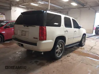 2009 GMC Yukon SLT w/4SB with VIN 1GKFC33069R299683, listed as a IAAI auction lot 41453259 with 182,415 mi miles. Bid and sale history available at carsss.com. Image 4.