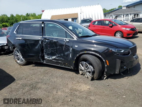 2025 Cadillac XT6 AWD Premium Luxury z VIN 1GYKPDRS9SZ120694, wystawiony jako Copart lot #57130005 z przebiegiem Nie podano mil oraz Szkody całkowita. Historia ofert i sprzedaży dostępna na DreamBid. Obrazek 4.