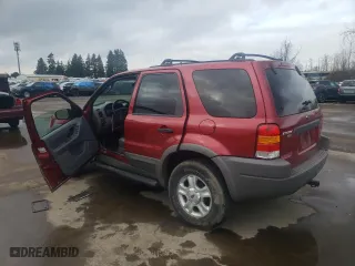 2001 Ford Escape XLT with VIN 1FMCU04101KA36194, listed as a Copart auction lot 43717295 with 72,265 mi miles and Salvage Title. Bid and sale history available at carsss.com. Image 2.
