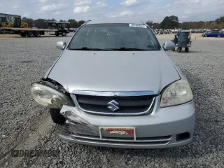 2006 Suzuki Forenza z VIN KL5JD56Z96K362651, wystawiony jako Copart lot #78306894 z przebiegiem 167 916 mil mil oraz Tytuł czysty. Historia ofert i sprzedaży dostępna na DreamBid. Obrazek 5.
