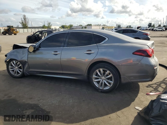 2015 Infiniti Q70 z VIN JN1BY1AP1FM541792, wystawiony jako Copart lot #86699094 z przebiegiem Nie podano mil oraz Szkoda całkowita • Salvage title. Historia ofert i sprzedaży dostępna na DreamBid. Obrazek 2.