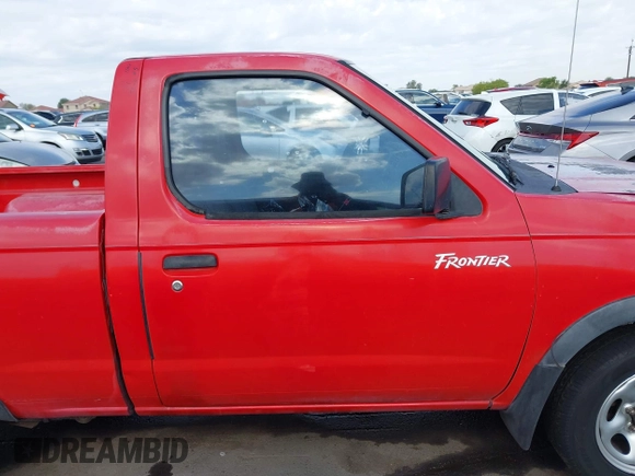 2000 Nissan Frontier XE z VIN 1N6DD21SXYC366427, wystawiony jako IAAI lot #42111404 z przebiegiem 176 579 mil mil oraz . Historia ofert i sprzedaży dostępna na DreamBid. Obrazek 14.