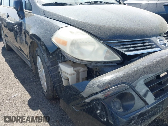 2009 Nissan Versa S with VIN 3N1BC11E19L440957, listed as a IAAI auction lot 40039437 with Not Provided miles and . Bid and sale history available at DreamBid. Image 12.