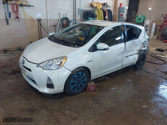 2014 Toyota Prius c One with VIN JTDKDTB32E1562490, listed as a IAAI auction lot 41869463 with 141,627 mi miles. Bid and sale history available at carsss.com. Image 17.