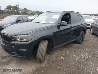 2015 BMW X5 xDrive35i with VIN 5UXKR0C54F0P00889, listed as a IAAI auction lot 42023099 with 196,387 mi miles. Bid and sale history available at carsss.com. Image 2.